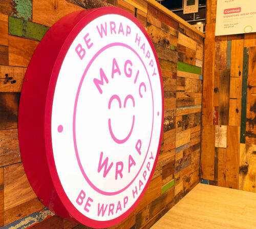 Circular lightbox sign, made by Sauce at Magic Wrap Cardiff